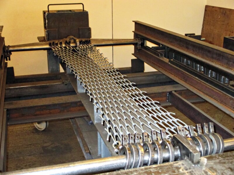 Professional quality control testing for metal fence tensile strength in a Chinese factory laboratory